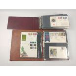 Two full folders of UK FDC First Day Covers