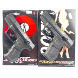 JAMES BOND - two toy cap guns by WICKE mounted on cardboard hangers one James Bond 007, the other