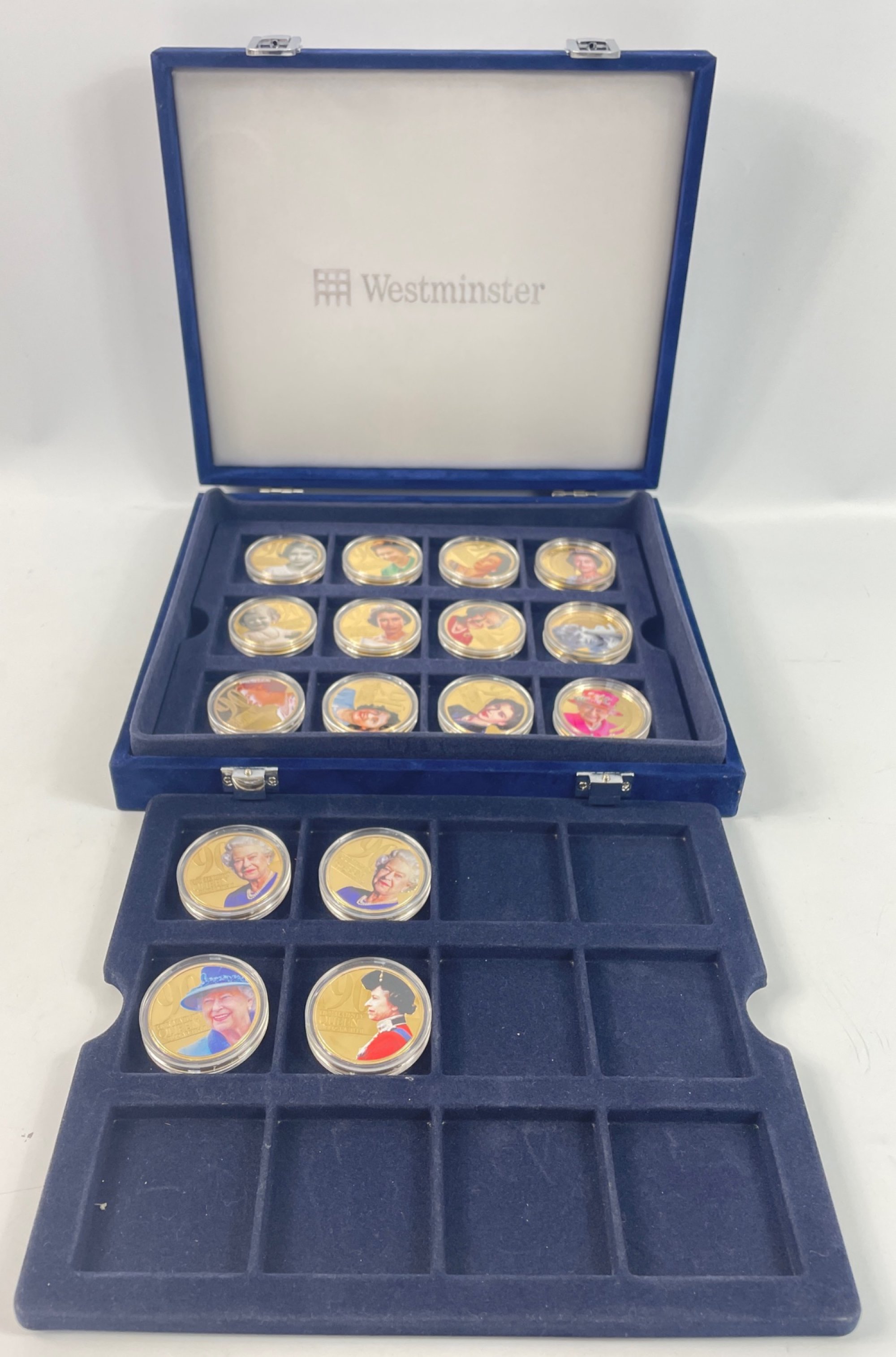 A Queen Elizabeth II 90th birthday collection of coins - 16 Commemorative coin set within an