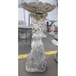 SUBSTANTIAL - A large heavy stone effect garden ornament