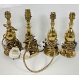 Four brass table lamps three of the same pattern 23cm high, plus one at 24cm