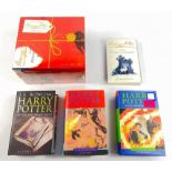 HARRY POTTER - A heat-sealed complete boxed set of 7 Harry Potter titles plus a paperback copy of