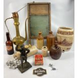 An interesting collection of antique stoneware, cleaning and household items to include glass