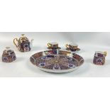 A ROSELLE OCC miniature tea service for two