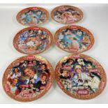 COCA-COLA - six decorative plates to include Roaring 20s, 30s Beauties, Fabulous 50s, Fashion