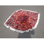 A PERSIAN BAKHTIARI handmade exuberant lozenge shaped rug - dimensions 140cm x 106cm approx