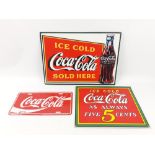 COCA-COLA - three enamelled Coke signs - a car licence plate size (30x15cm), a Coke ice sign