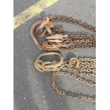 Two sets of solid iron 'lifting chains' - 2.8m length one length approx with shackle - the other