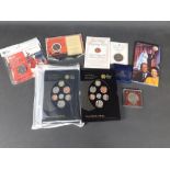 A collection of Commemorative collectors coin packs to include 2008 Royal Mint BUNC Royal Shield