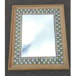 A top quality wall mirror made by a member of Blind Veterans UK, wooden frame measures 65x55cm