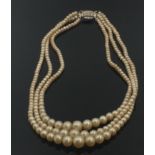 VINTAGE: A nice set of triple strung pearls with clasp