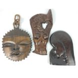 A trio of African tribal items to include a wooden mask of a woman (22x15cm approx), a full face