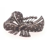 A VINTAGE Marcasite studded brooch in bow form weight 10.05g gross approx dimension 4cm across