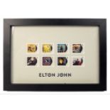 Framed set of ROYAL MAIL SIR ELTON JOHN collection of eight 1st class stamps album covers by John