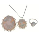 A cameo set in 18ct stamped gold comprising 1 pendant chain 38cm long, pendant 2.5x2.0cm, 1 brooch