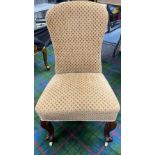 A good example of an EDWARDIAN upholstered low chair with mahogany legs and claw feet on original