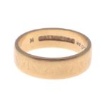 A 22ct stamped yellow gold wedding band weight 5.44g approx ring size M