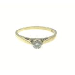 A 9ct Gold ring (375 stamped) set with a single 3mm diameter single solitaire diamond