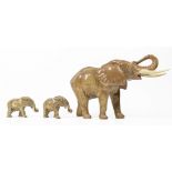 A family of three SYLVAC elephants, the tallest being approx 23cm (1 trunk damage repaired)