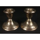 A pair of small table silver candlesticks hallmarked Birmingham 1919 weight 351g approx