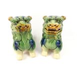 A pair of attractive decorative jade green coloured glazed ceramic FOO DOGS in lovely condition