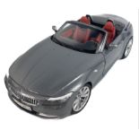 A KYOSHO 1:18 scale BMW Z4 die cast model in new condition within original packing