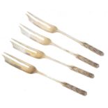 Four silver hors d'oeuvres forks by Liberty & Co.,