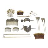 A selection of hair combs and pins,