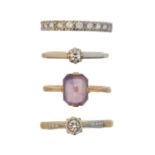 Four gem-set rings,