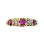 An 18ct gold ruby and diamond five stone ring,