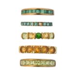 Five 9ct gold gem-set band rings,