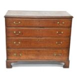 George III oak chest of four graduated drawers