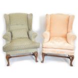 A pair of wingback armchairs