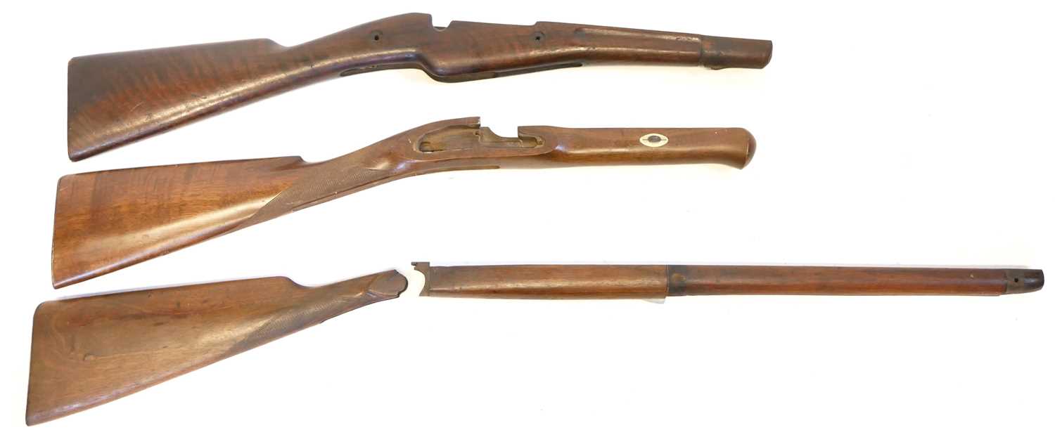 Berthier rifle stock and two other stocks and a forend