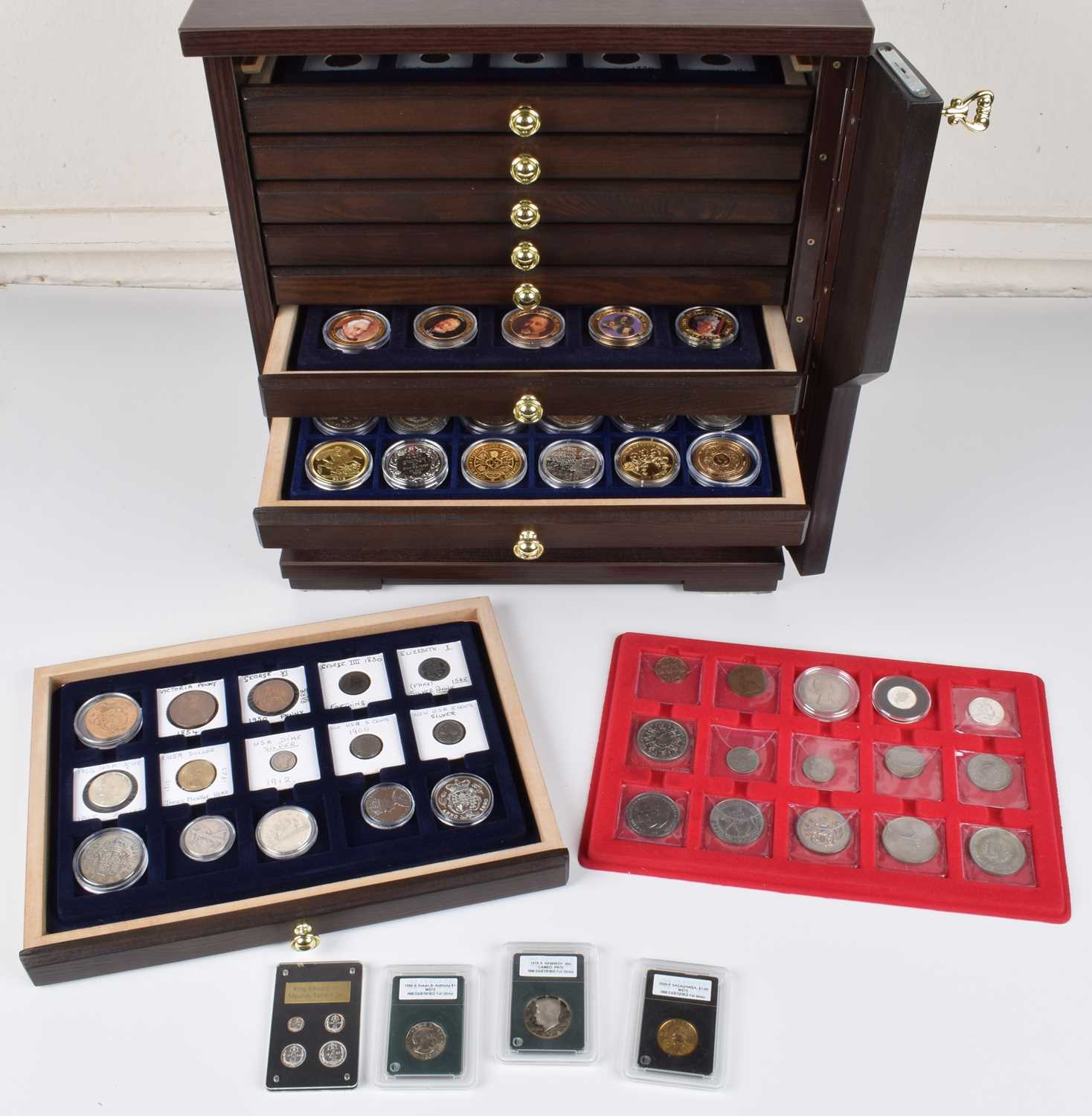 Assortment of modern commemoratives and other miscellaneous coins and cabinet.