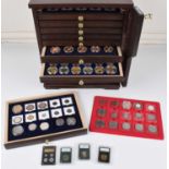 Assortment of modern commemoratives and other miscellaneous coins and cabinet.