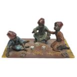 Cold Painted Bronze Figure Group of three boys seated on a carpet playing with dice Franz Bergman