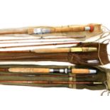 Three split cane fishing rods,