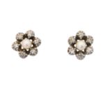 A pair of pearl and diamond earrings,