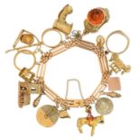 A 15ct gold charm bracelet,