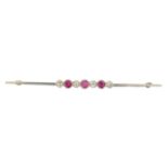 An early 20th century ruby and diamond bar brooch,