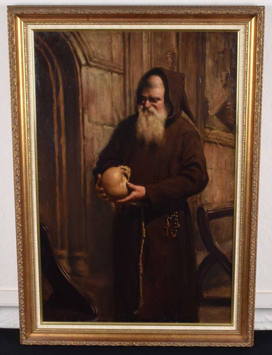 Y. Wilson (British 19th/20th century) A standing monk holding a human skull - Image 2 of 2