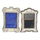 Two silver fronted frames,