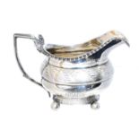 A George IV silver millk jug,