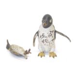 Three cold painted bronze penguins