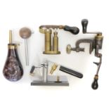 Muzzle loading equipment and two shotgun reloading tools