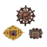 Three 19th century garnet brooches,