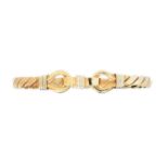 A 9ct gold bangle,