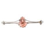 A topaz and diamond bar brooch,