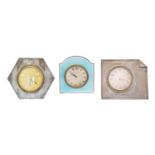 Three silver fronted travel clocks,